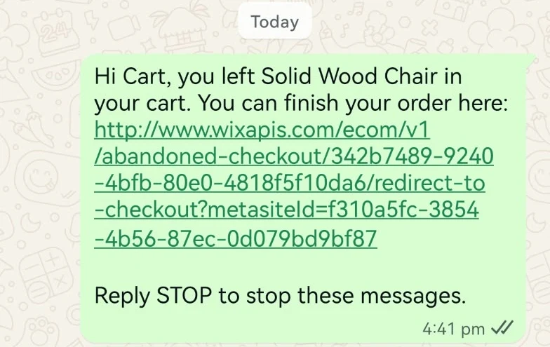 Real WhatsApp abandoned cart reminder from a Wix test store: Hi, you left Solid Wood Chair in your cart. You can finish your order here, with the checkout link and Reply STOP to stop these messages